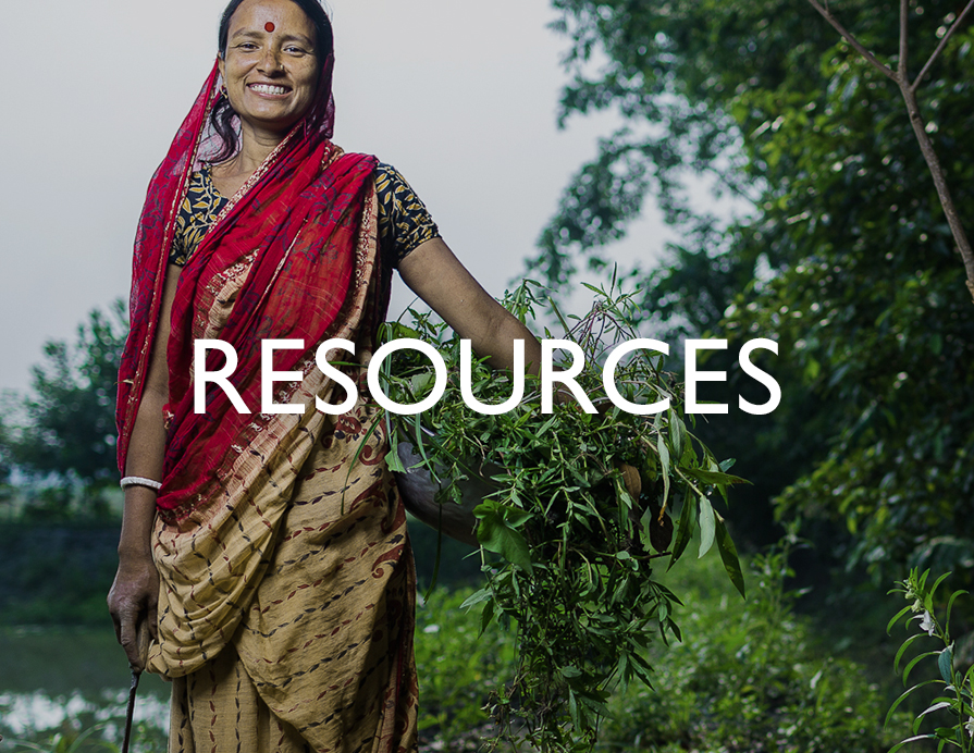 Resources - A smiling woman standing outdoors