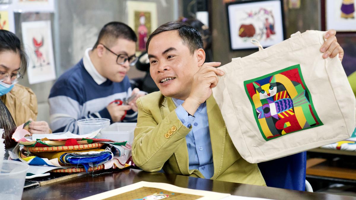 Mr. Le Viet Cuong, the 48-year-old social entrepreneur, artist, and co-founder of Vun Art