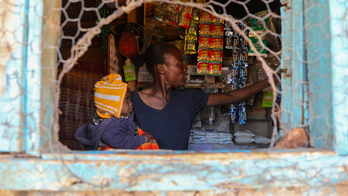 Mary Imoit is managing her small retail shop located in Manyatta Zebra village, Isiolo County. photo credit: Anthony Nyandiek/USAID Nawiri 