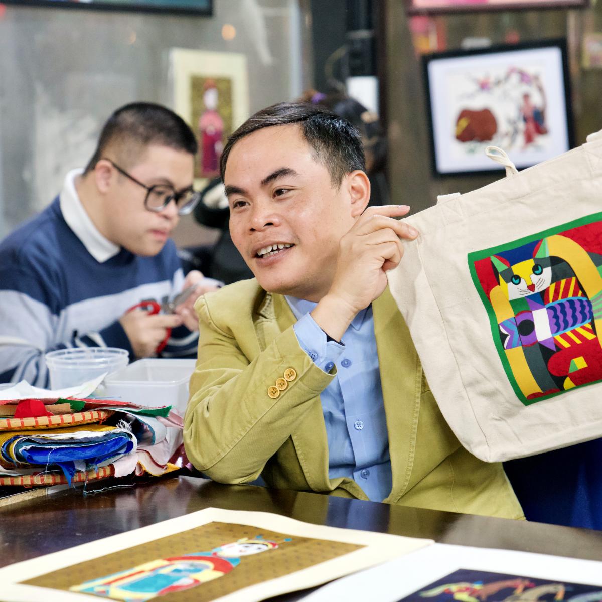 Mr. Le Viet Cuong, the 48-year-old social entrepreneur, artist, and co-founder of Vun Art