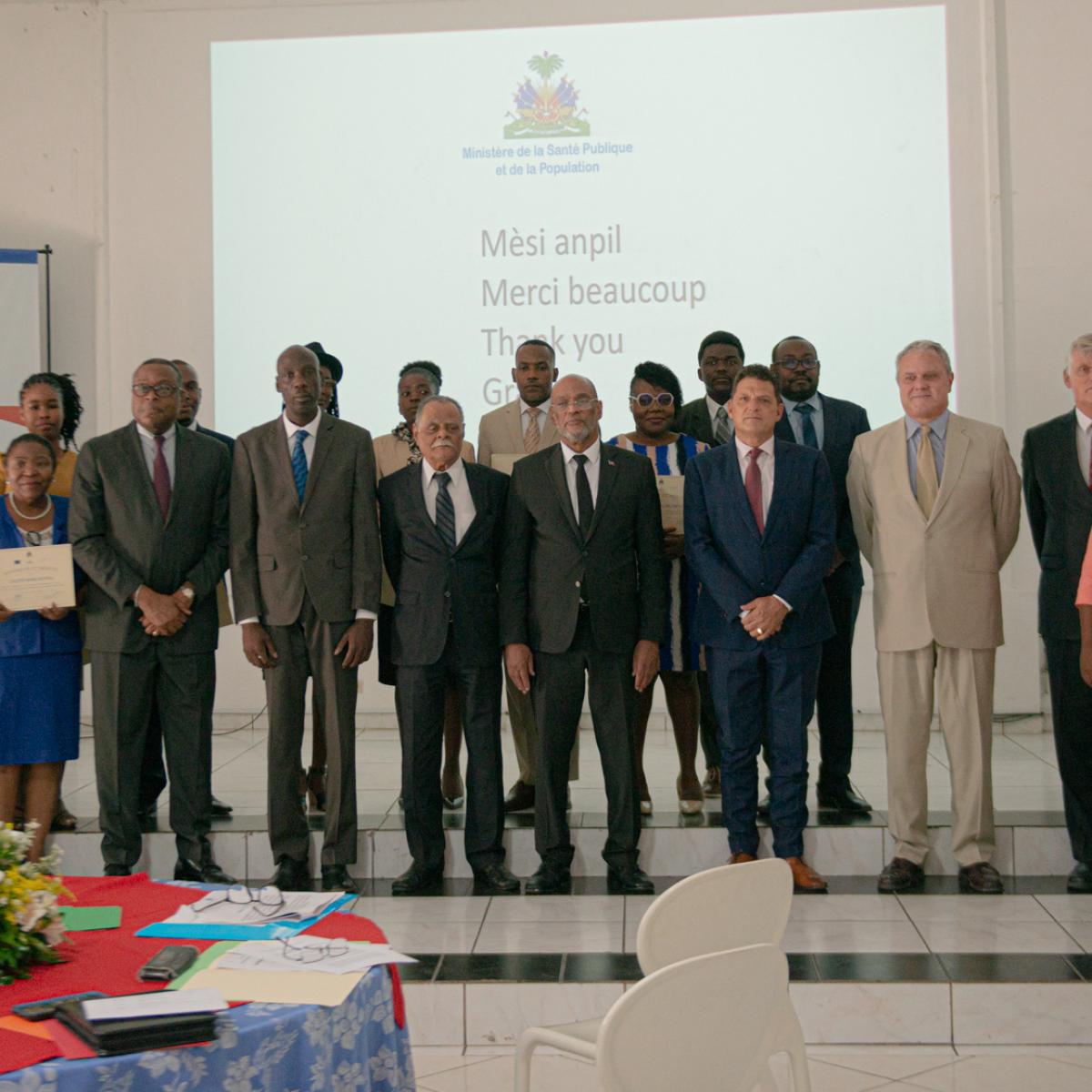 This image represents U.S Chargé d’Affaires Eric Stromayer, Prime Minister of Haiti Ariel Henry, and representatives of the European Union and the United Nations at the presentation of the SMART survey 2023