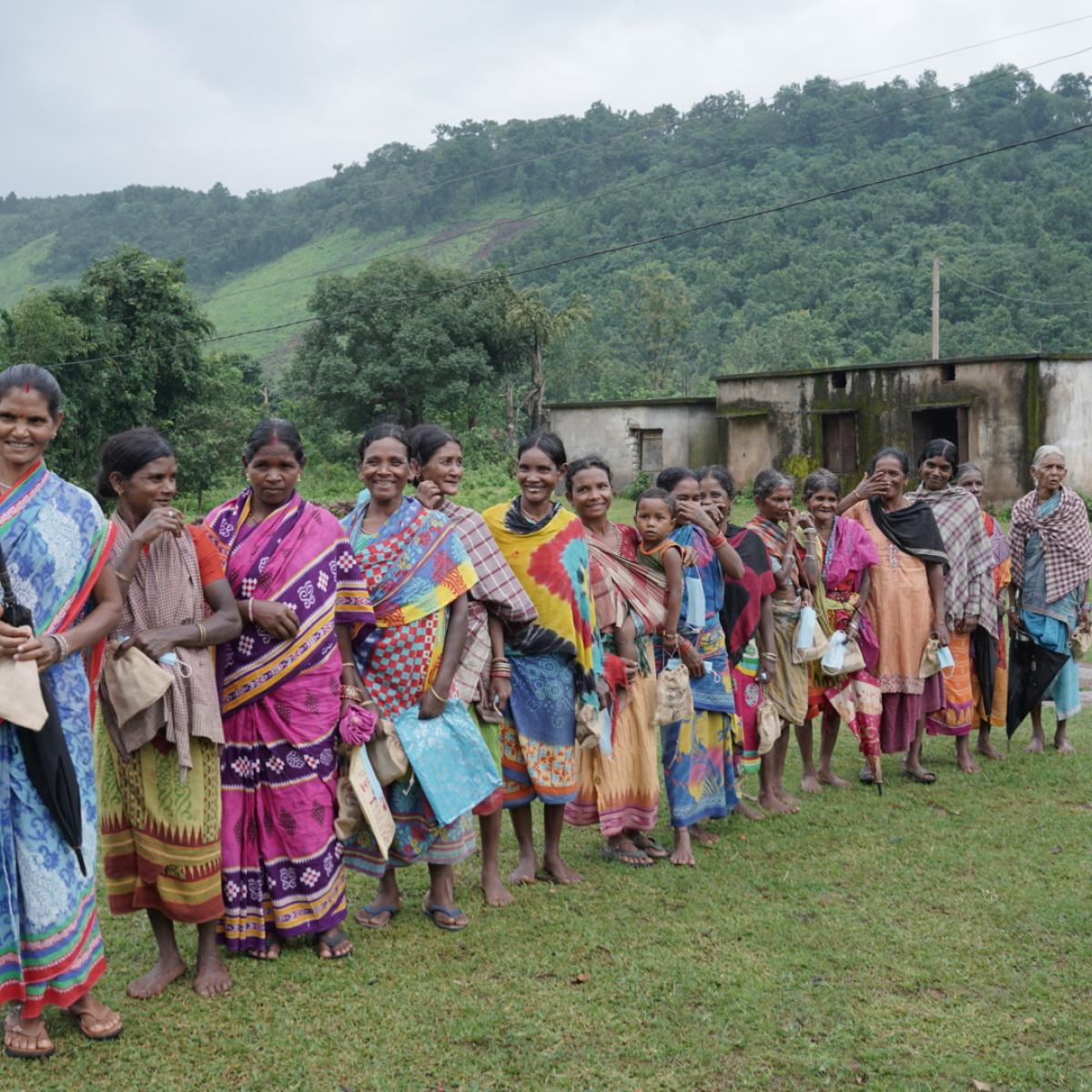 Women from the Kondh tribe in Odisha, India, after receiving their COVID-19 vaccination. 