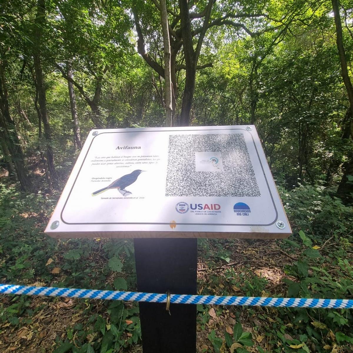 A sign along the first bird watching trail for people with disabilities established in South America. The trail is located in a natural private reserve close to the southwestern city of Cali, Colombia.