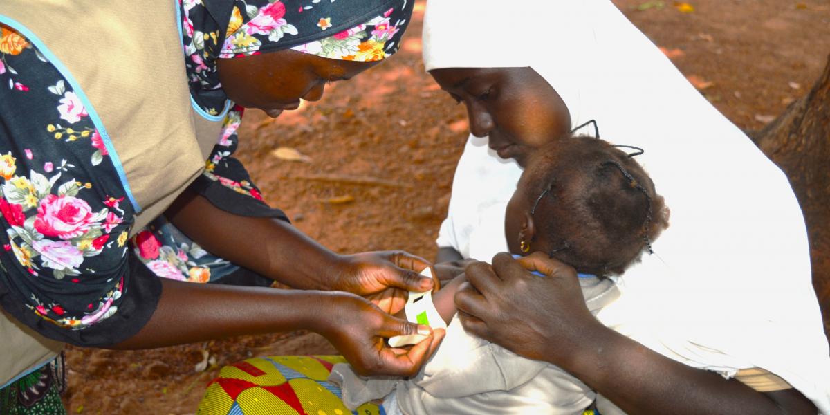 A child being screened for malnutrition