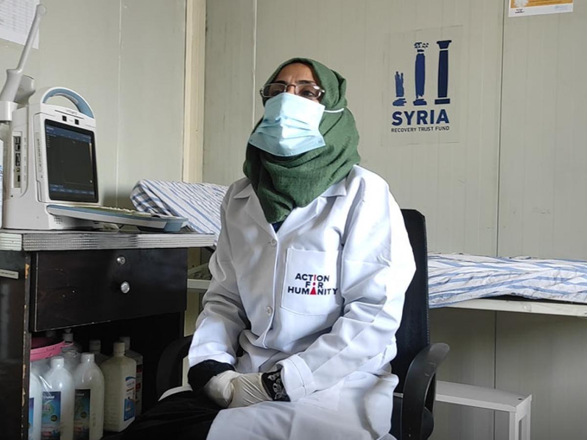 Syrian midwife at clinic