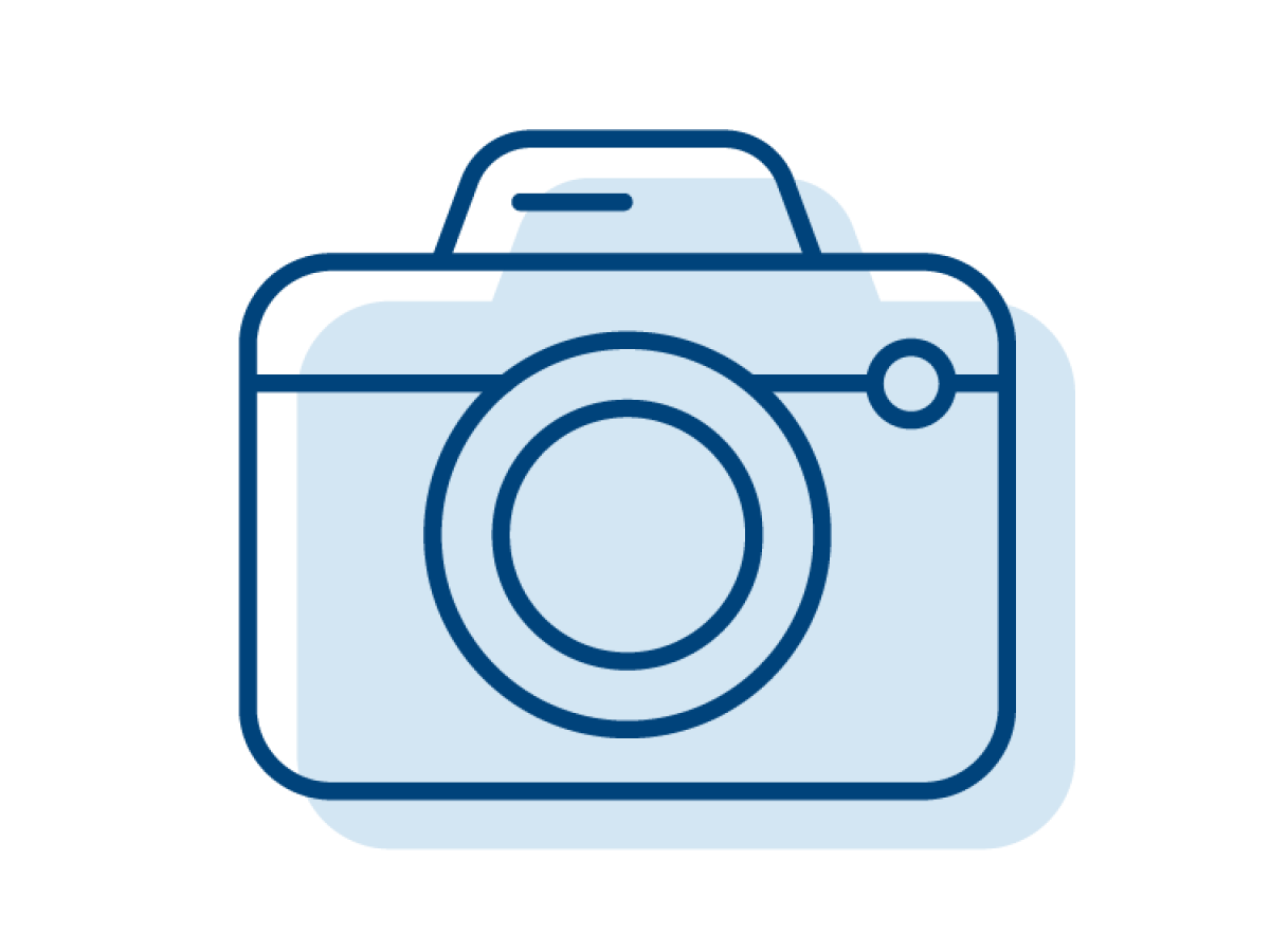 Illustrated icon of a camera, representing photos.