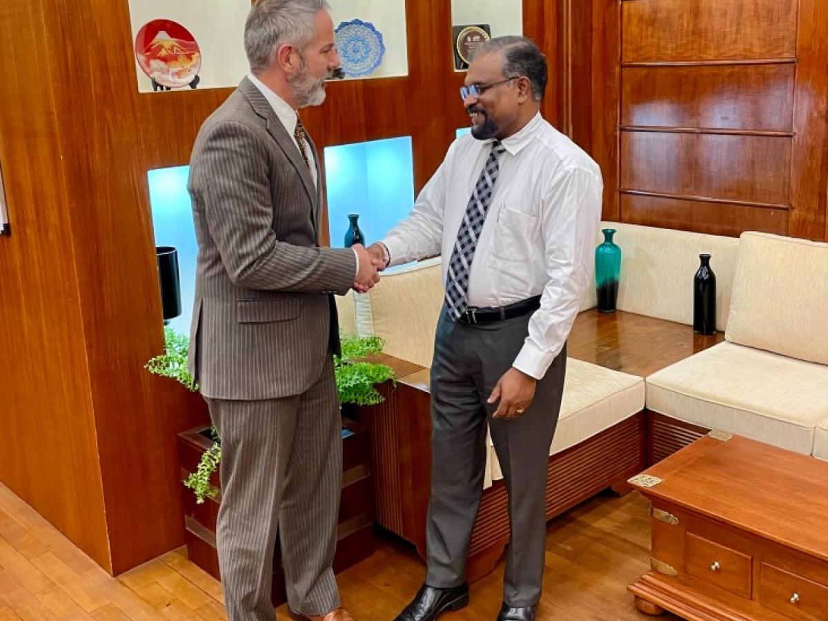 Finance Ministry Secretary K.M.M. Siriwardena and US Deputy Chief of Mission Douglas Sonnek celebrate the Development Objective Assistance Agreement at the Finance Ministry.
