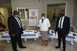 At the handover of 70 ICU beds donated by the United States to Namibia (from left to right): McDonald Homer, USAID Country Representative, Hon. Dr. Esther Muinjangue, Deputy Minister of Health and Social Services, and Ben Nangombe, Executive Director of the Ministry of Health and Social Services.