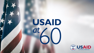 USA flag with USAID's 60th Anniversary-French