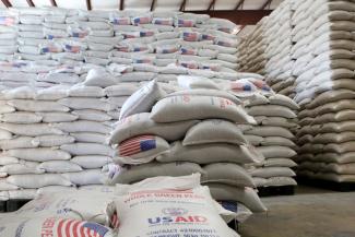 USAID food stocks in the UN World Food Program warehouse in Port-au-Prince. USAID supports WFP year-round to maintain enough food to feed approximately 300,000 people for one month in Haiti to be ready during emergencies. Photo Credit: USAID