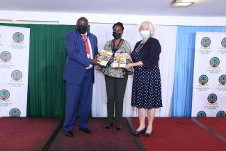 USAID Deputy Mission Director Heather Schildge participates in the event marking the official handover of the Afya Elimu Fund to the Higher Education Loans Board. 