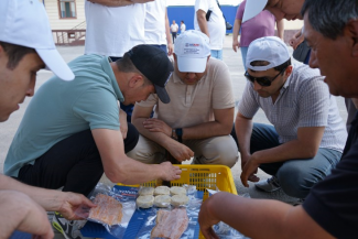 Participants visiting the fish factory in Uzbekistan 