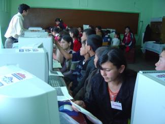 Youth participate in a computer class provided by USAID’s Computers for Uzbek Schools Project in 2005.