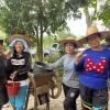 Women coffee farmers with a coffee bean sheller