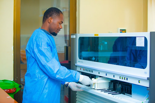 USAID Afya Endelevu laboratory Scientist, Mr. Elias Mariki, processing HIV viral load samples in the PCR Laboratory at Ligula Regional Referral Hospital in Mtwara Region, Southern Tanzania. 