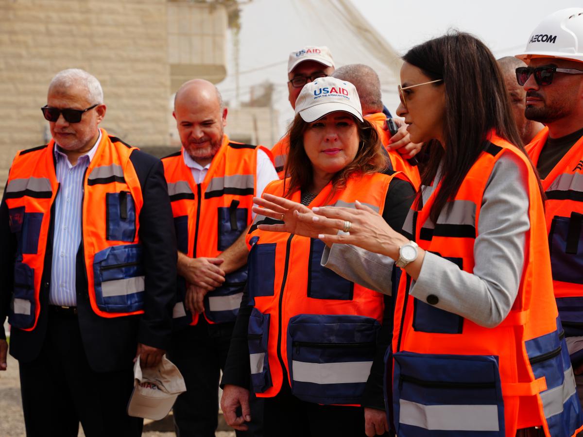 Mission Director Amy Tohill-Stull and Mayor of Jericho Abdel Kareem Sider visit the 10th house to be connected to sewer lines through the USAID-supported Jericho Wastewater project.