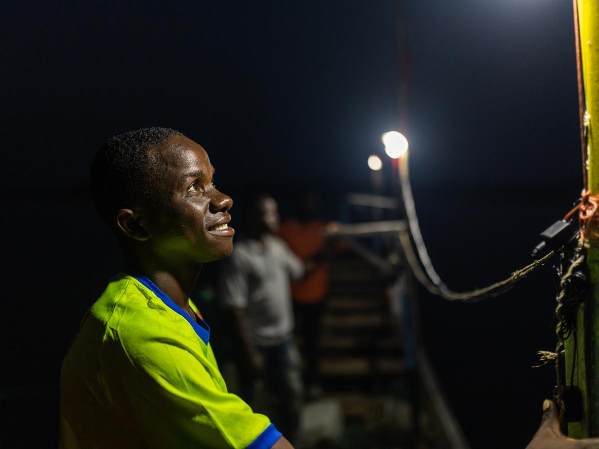 A fisherman with a solar powered light