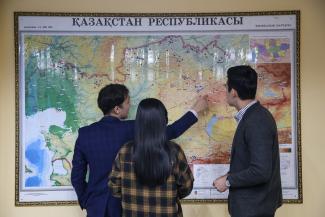 Staff at the Department of Hydrology at Kazhydromet discuss flood-prone areas in Kazakhstan