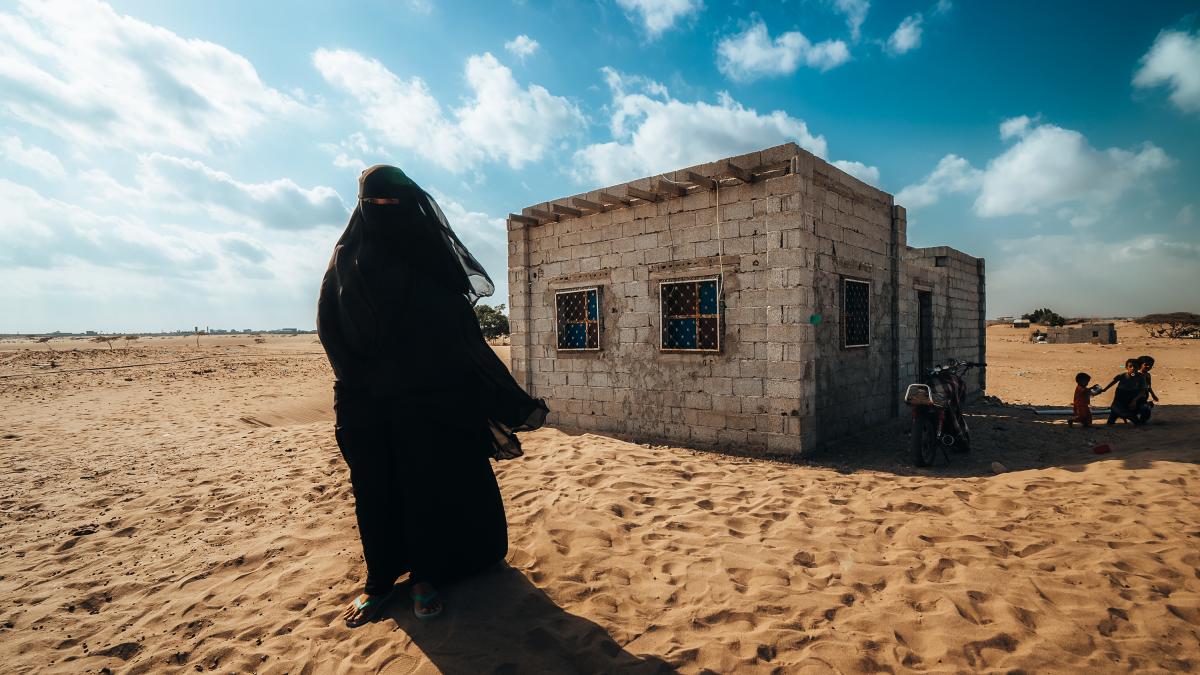 Profits form Ms. Taktarah Naser Saleh's milk sales in Yemen helped her buy a new home.