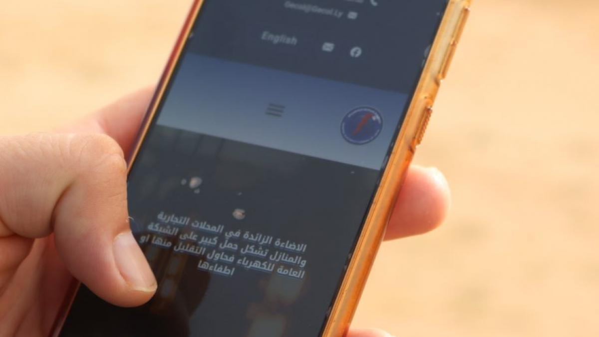 Libyan using a smart phone.