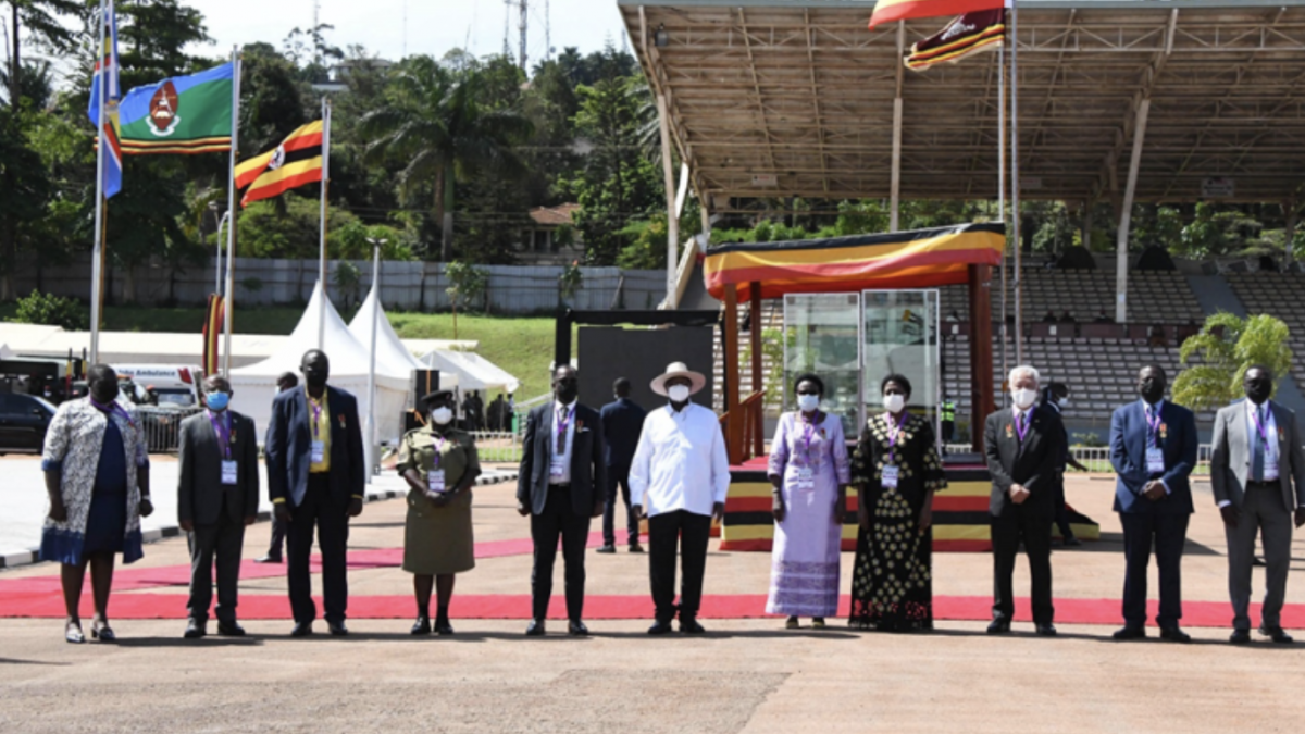 Image of metalists with the President of Uganda 6th from the left. Dr. Ciccy Kityo is 4th from the left