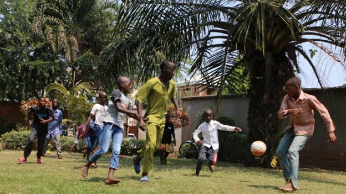 Survivors of trafficking in persons playing soccer at the accommodation center 