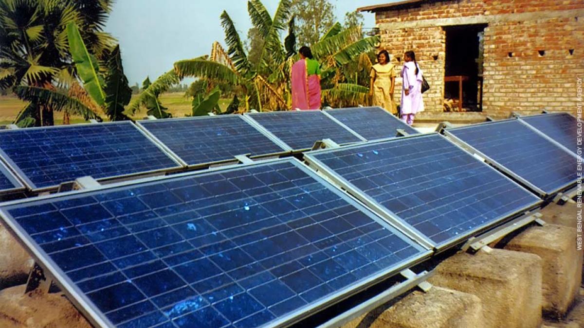 Solar panel arrays provide power for a village in West Bengal