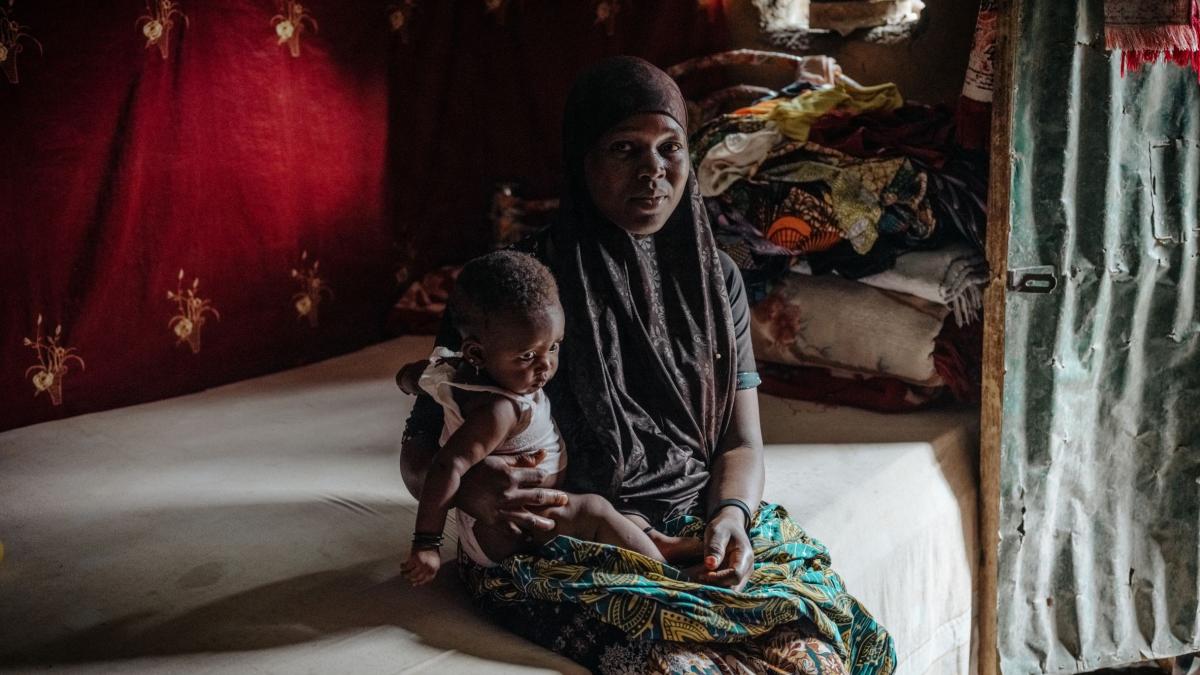 Mother and child in their home in Southern Niger
