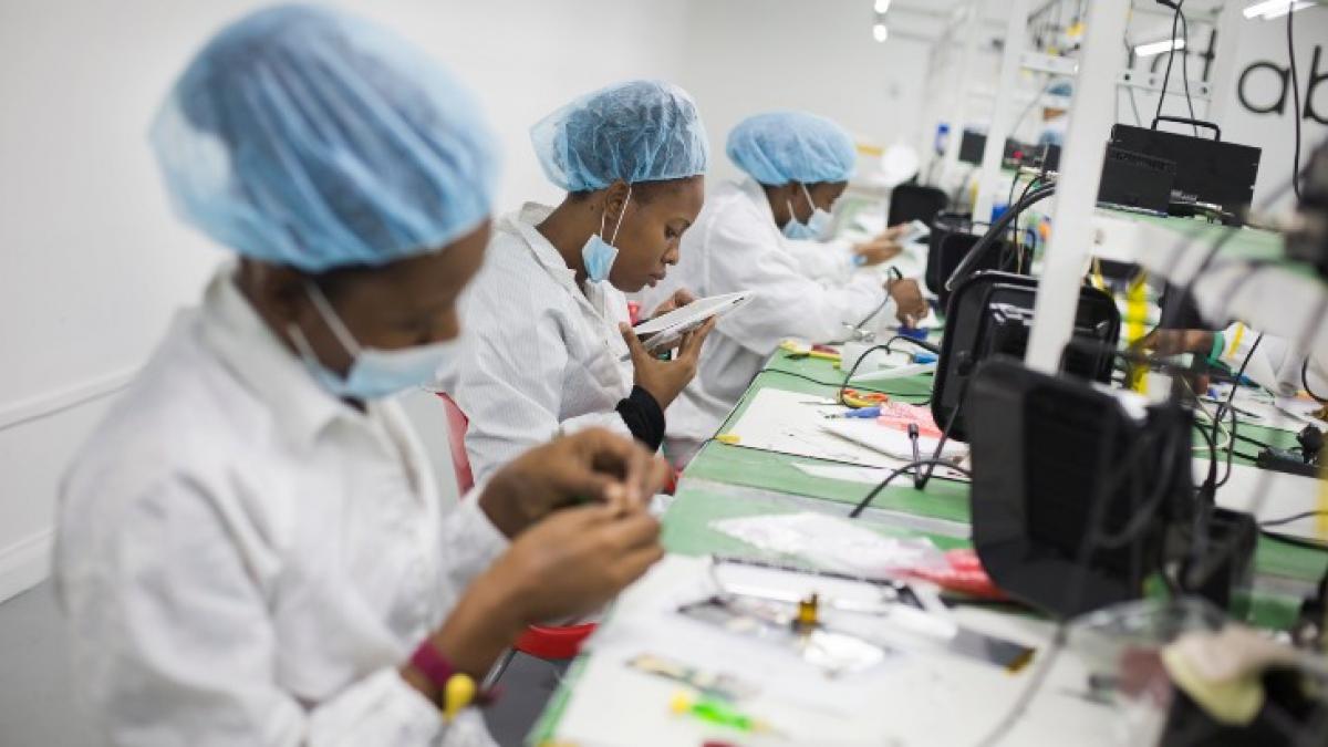 Employees assemble tablets at the Surtab factory in Port-au-Prince, Haiti