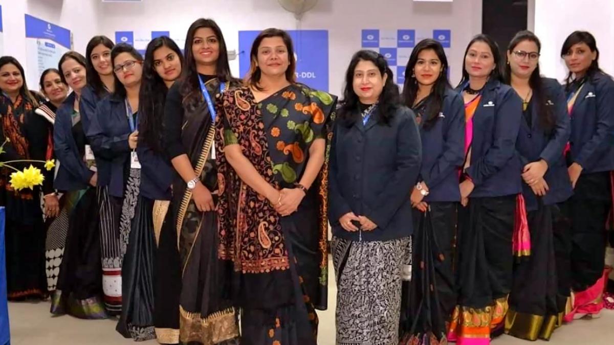The female professionals of Tata Power-DDL pose for a group photo
