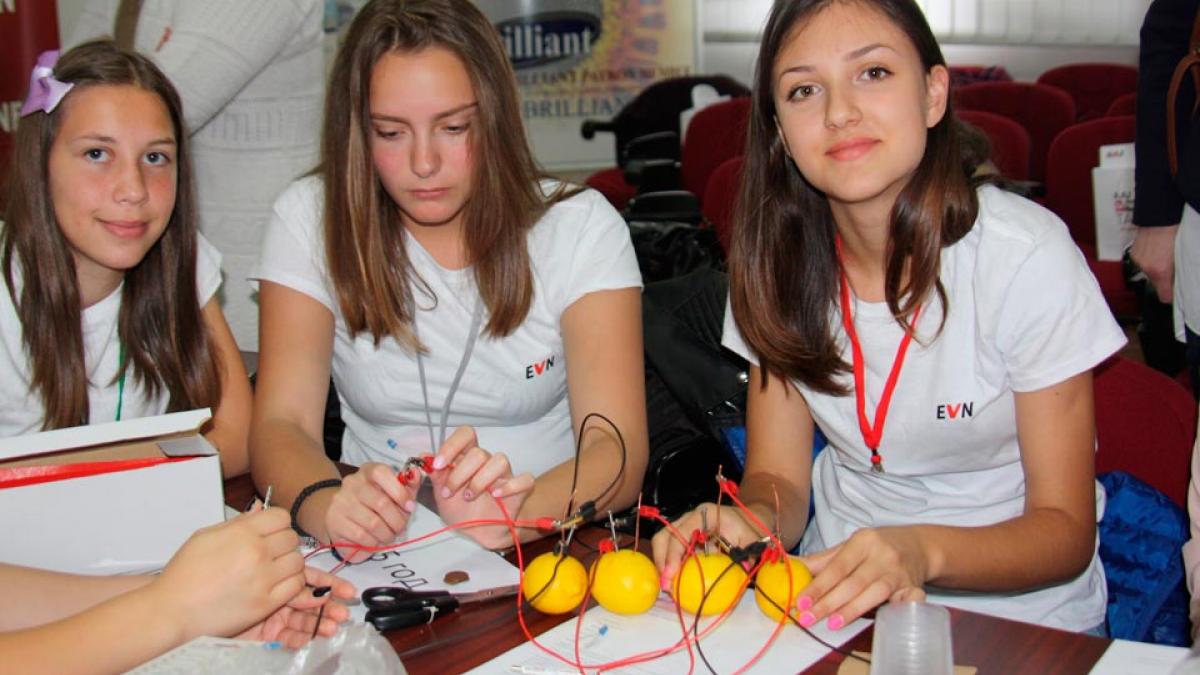 Girls learn how to create electricity from lemons in a hands-on experiment at EVN Macedonia’s inaugural Bring Your Daughter to W