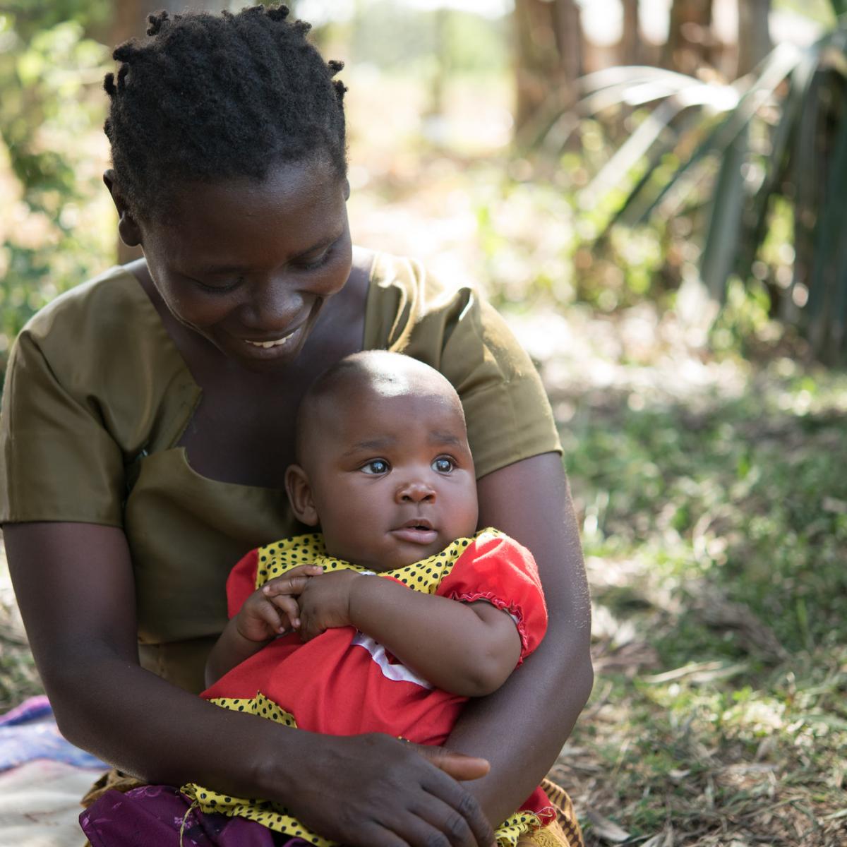 A mother in Kenya holds her baby