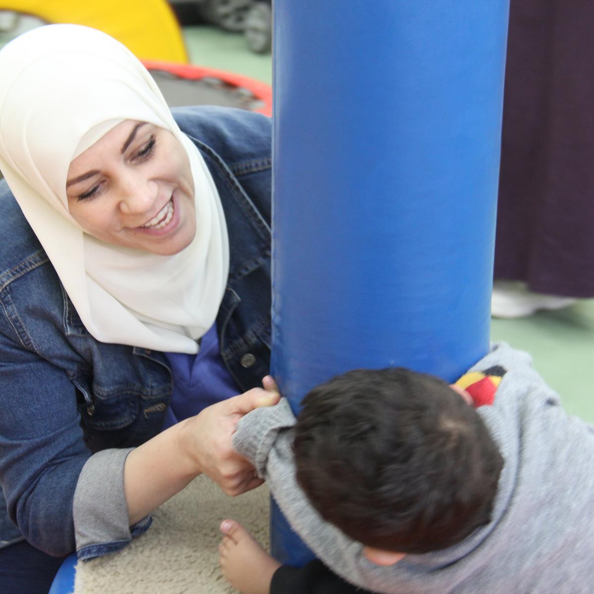 At the Jerusalem Princess Basma Center, therapists work with Palestinian children with disabilities to address their physical and emotional needs.