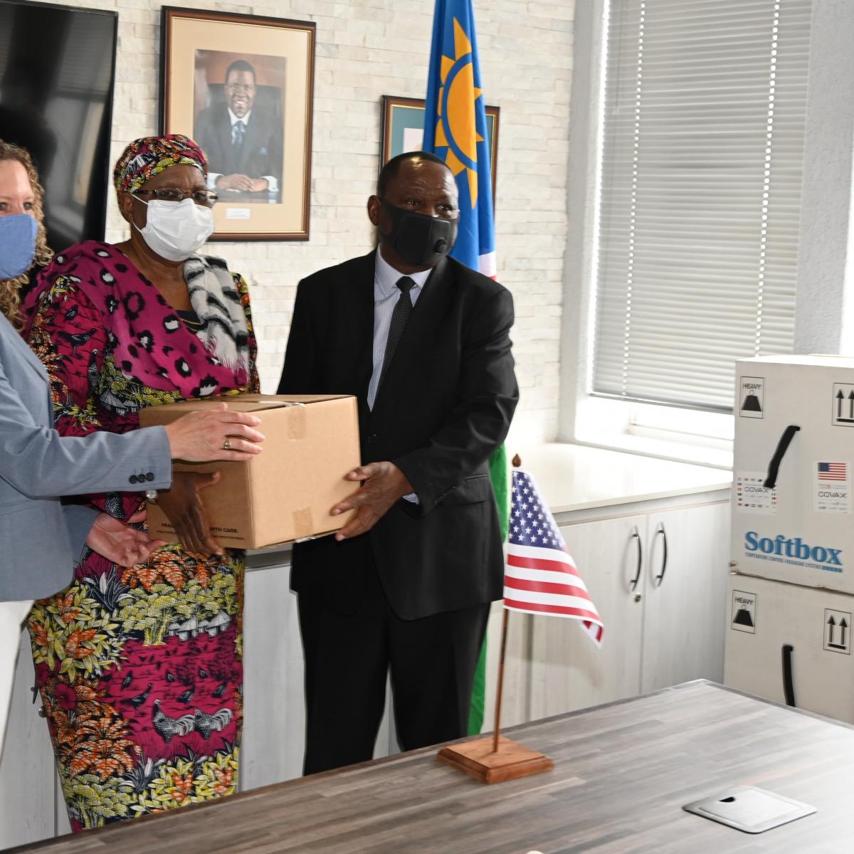 Handing over 124,000 doses of the Pfizer BioNTech COVID-19 vaccine donated by the United States government (from left): U.S. Embassy Chargé d’Affaires, Jess Long, Deputy Prime Minister and Minister of International Relations and Cooperation, Hon. Netumbo Nandi-Ndaitwah, and the Minister of Health and Social Services, Hon. Dr. Kalumbi Shangula.