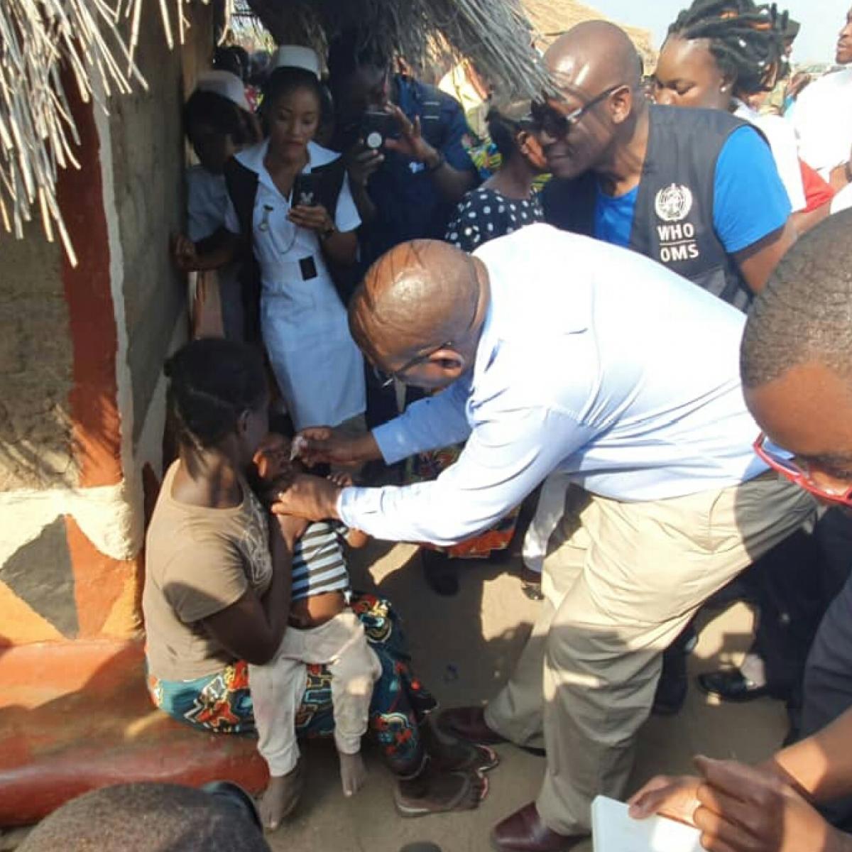 Zambia's Minister of Health administers an oral polio vaccine in 2019