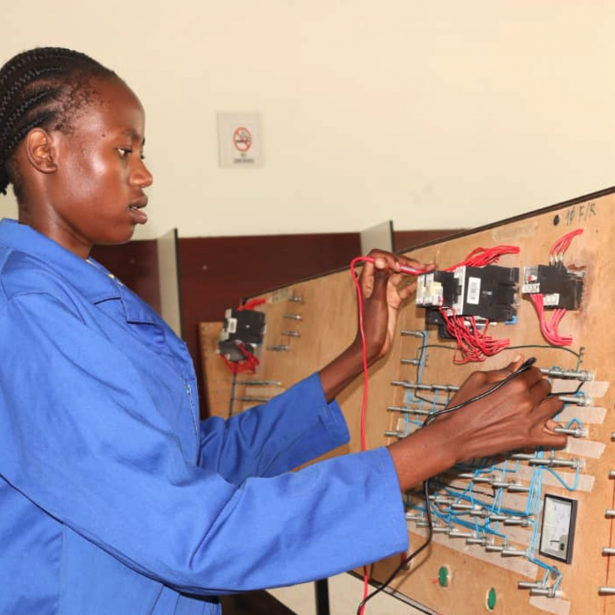 Members of DREAMS through Project Hope learn to become electricians
