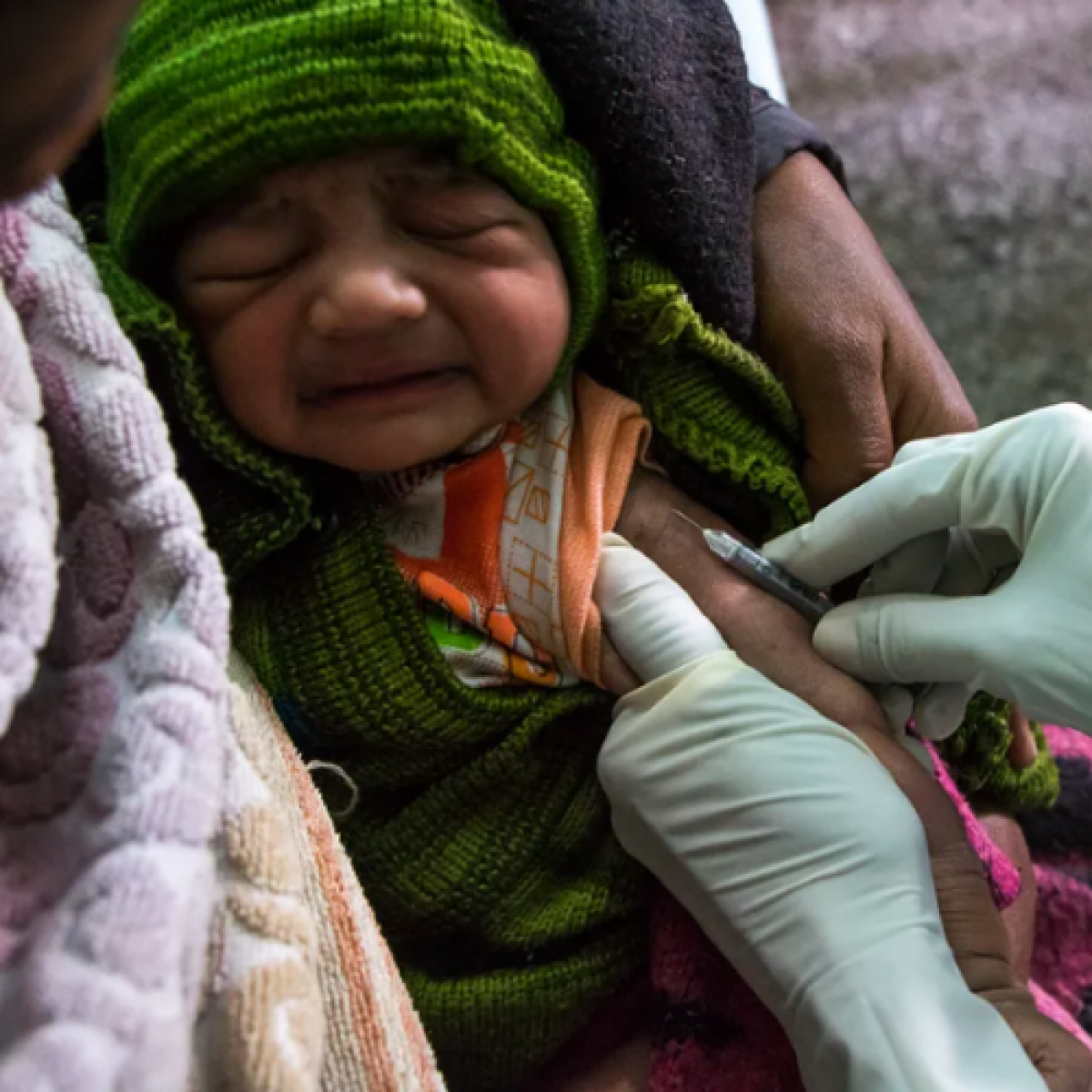 Infant receiving immunization