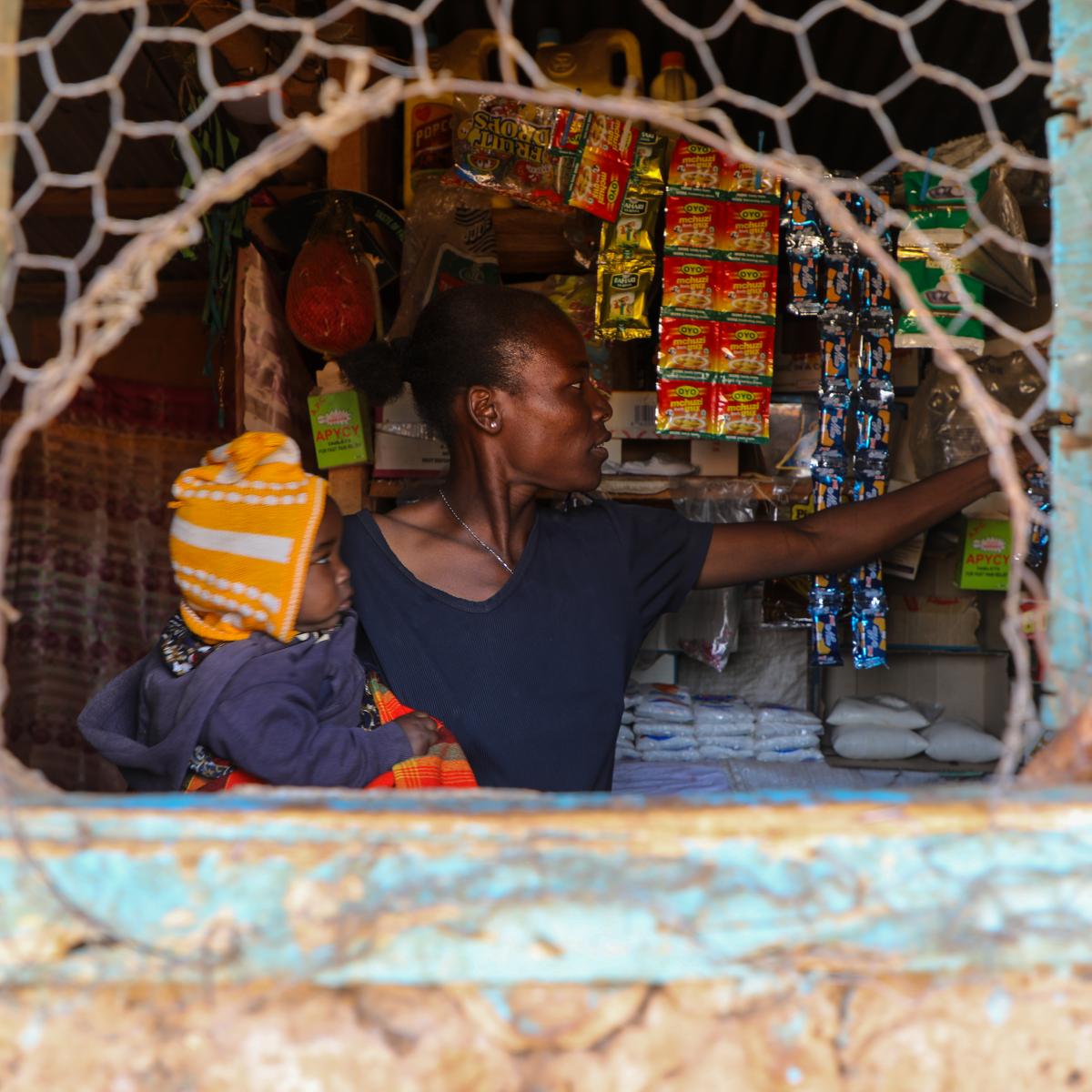 Mary Imoit is managing her small retail shop located in Manyatta Zebra village, Isiolo County. photo credit: Anthony Nyandiek/USAID Nawiri 