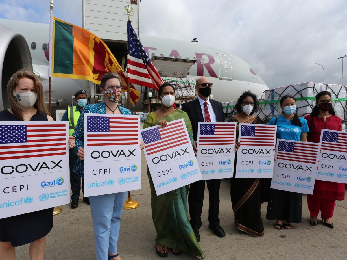 Representatives from the U.S. government, the Sri Lankan government, WHO, and UNICEF greet the arrival of 1.5 million vaccines in Sri Lanka through COVAX.