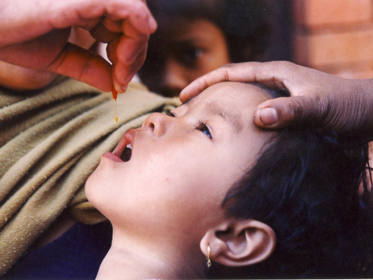 A child receives oral medication