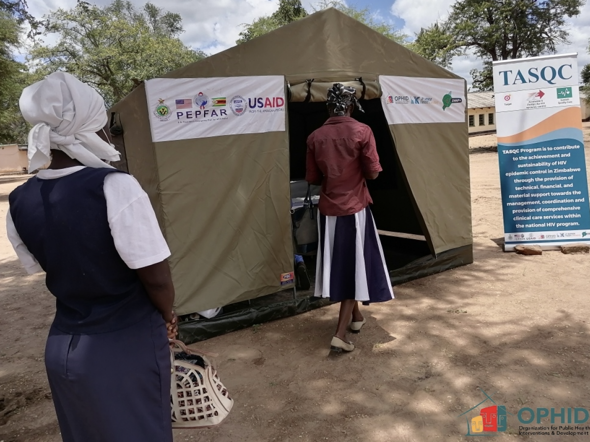 Bringing treatment to communities: women queue up for outreach services to collect their antiretroviral therapy and go through cervical cancer screenings in Chiredzi 