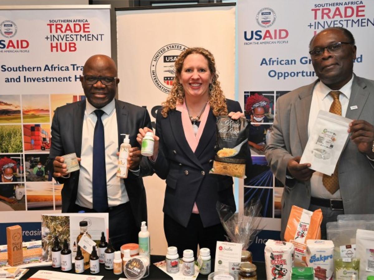Executive Director of the Ministry of Industrialization and Trade, Sikongo Haihambo, Chargé d’Affaires of the U.S. Embassy Jessica Long, and USAID Country Representative Dr. McDonald Homer presenting products of Namibian companies that are supported by the USAID TradeHub program.
