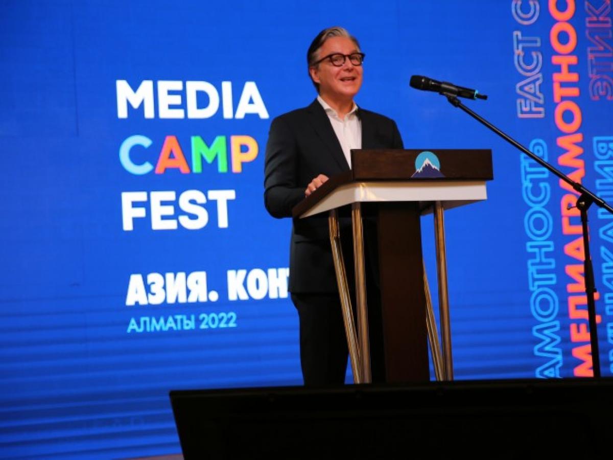 Luis Rivera on stage giving remarks at the Media Camp Fest