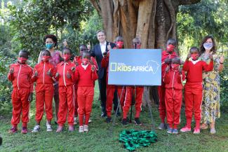 Secretary of State Anthony Blinken, WildlifeDirect CEO, Dr Paula Kahumu and the Walt Disney Company - Africa Vice President Christine Service in Karura Forest with students from Red Rose Primary School to announce National Geographic Kids Africa TV show.