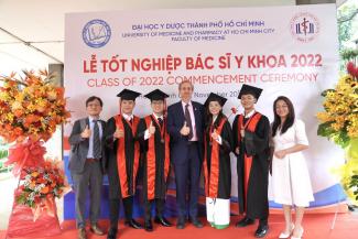 USAID Assistant Administrator for the Asia Bureau Michael Schiffer and USAID/Vietnam staff in a group photo with some new graduates.