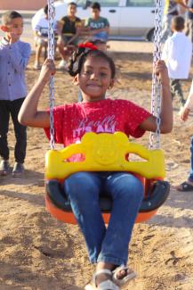 Children enjoying the new playground in Ghadamis, Libya