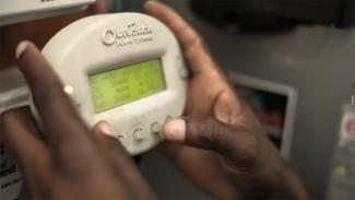 A user views current load via a monitoring device 