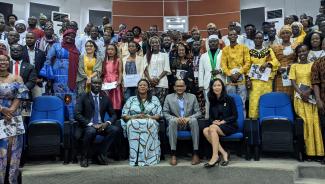 L-R: Dr. Bara Ndiaye, director of YALI RLC Dakar, Ms. Nene Fatoumata Tall, Minister of Youth, a representative of CESAG Director General, and Ms. Ying Hsu, acting USAID Mission Director surrounded by YALI graduates
