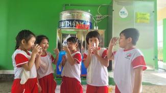 School students enjoy water from the new drinking water system.