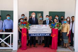 USAID Country Representative to Lao PDR Mr. Michael Ronning and Director General Department Healthcare and Rehabilitation, Ministry of Health Dr. Khamsay Detleuxay with others at the Rehabilitation Unit, in Kham District Hospital, Xieng Khouang Province